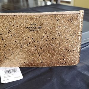 Coach gold wristlet